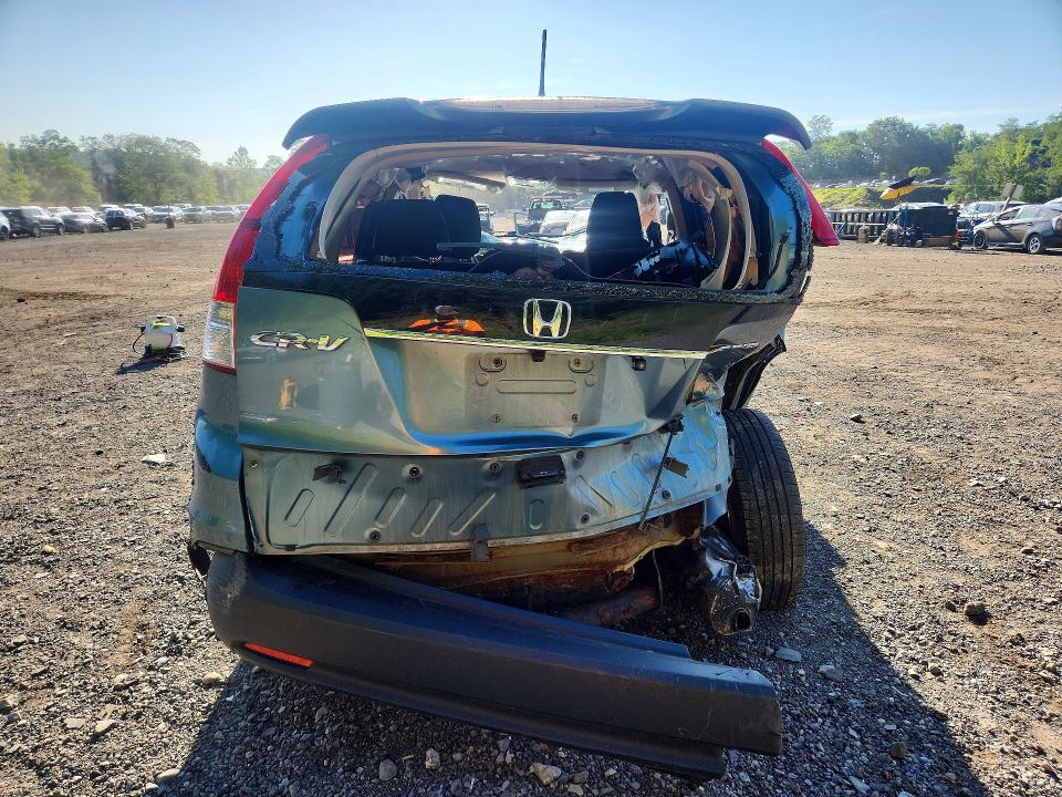 Photo 6 from auction – 2013 HONDA CR-V with VIN 2HKRM4H33DH689932
