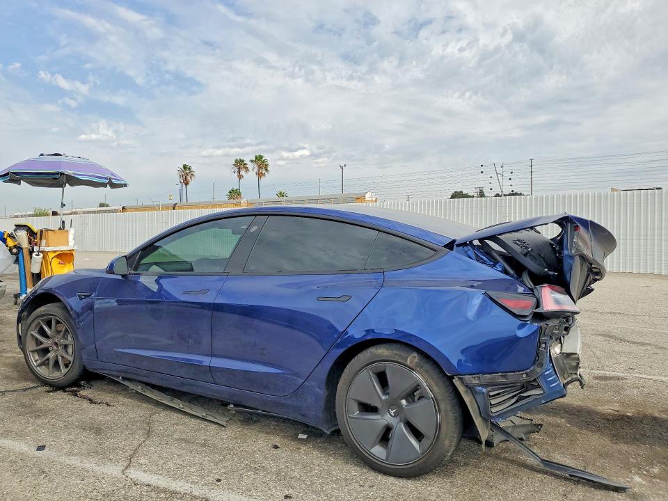 Photo 2 from auction – 2022 TESLA MODEL 3 with VIN 5YJ3E1EAXNF372721