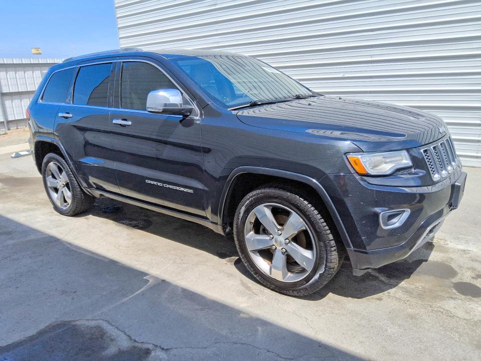 Photo 4 from auction – 2015 JEEP GRAND CHEROKEE with VIN 1C4RJECG1FC759581