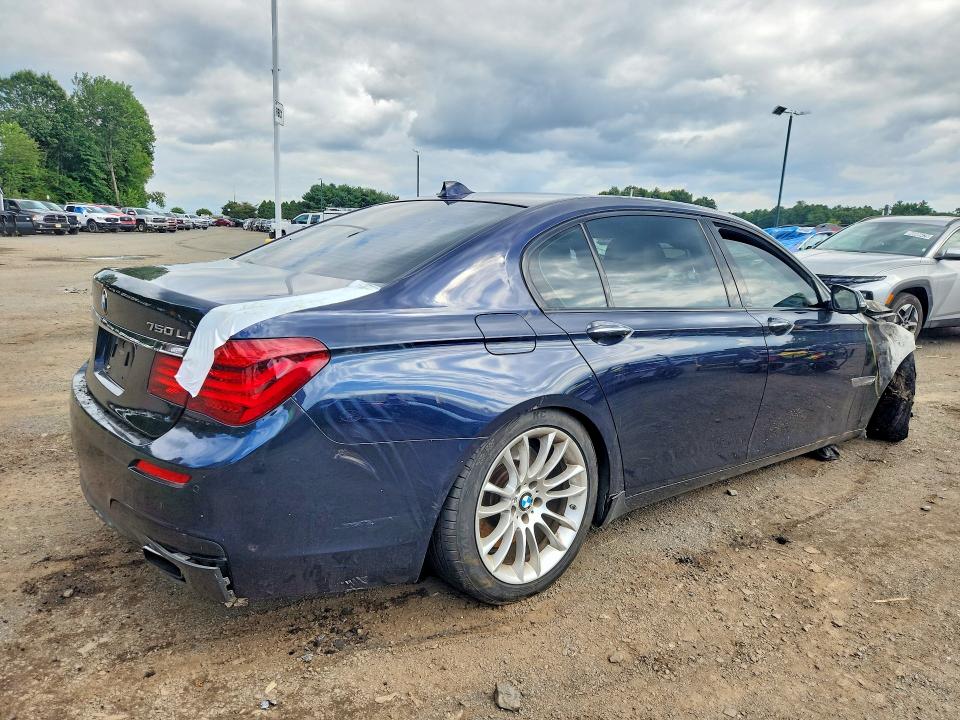 Photo 3 from auction – 2014 BMW 750 with VIN WBAYF8C58ED142505
