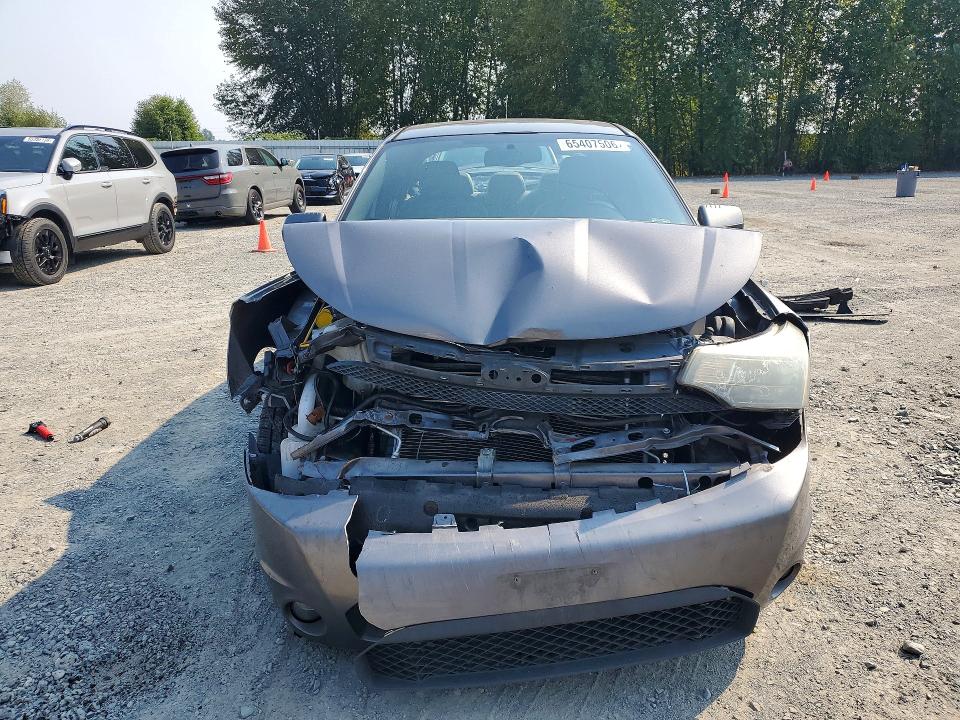Photo 5 from auction – 2011 FORD FOCUS with VIN 1FAHP3GN7BW203152