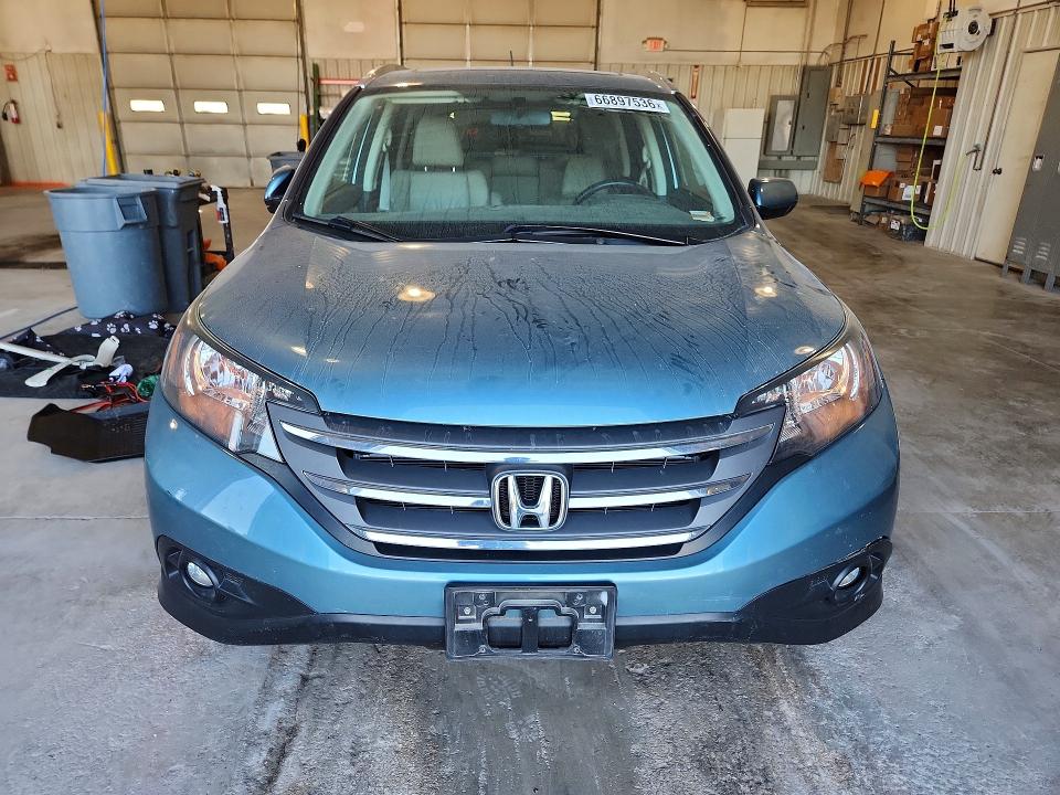 Photo 5 from auction – 2014 HONDA CR-V with VIN 2HKRM4H79EH717737