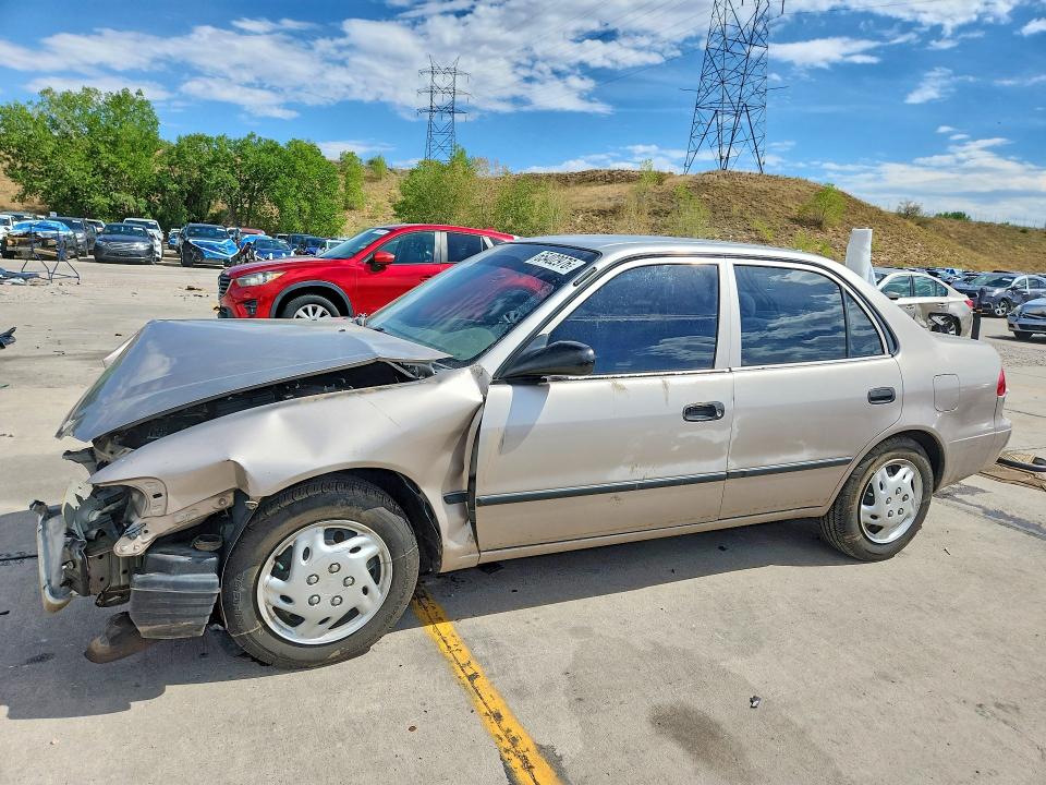 TOYOTA COROLLA 2000 with VIN 1NXBR12E2YZ393142 - Photo from auction