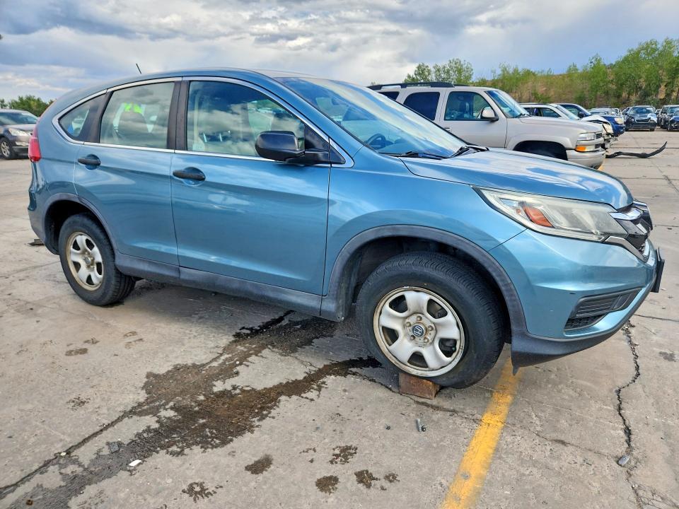 Photo 4 from auction – 2015 HONDA CR-V with VIN 5J6RM4H32FL083384