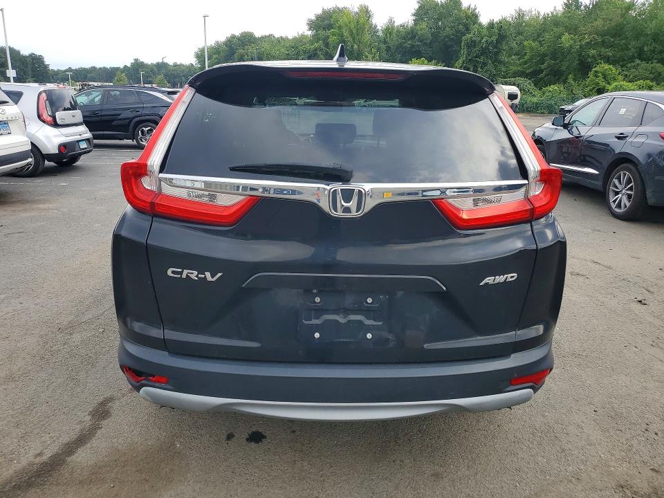 Photo 6 from auction – 2018 HONDA CR-V with VIN 7FARW2H85JE017590