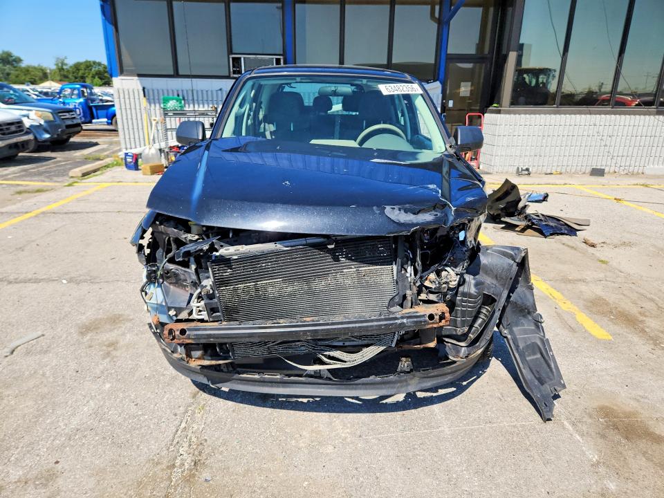 Photo 5 from auction – 2011 FORD ESCAPE with VIN 1FMCU0C76BKB33374