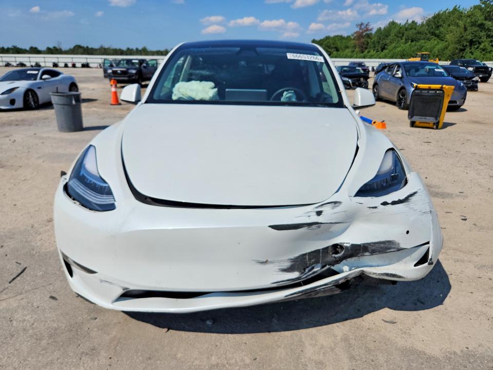Photo 5 from auction – 2022 TESLA MODEL Y with VIN 7SAYGDEE2NF463604