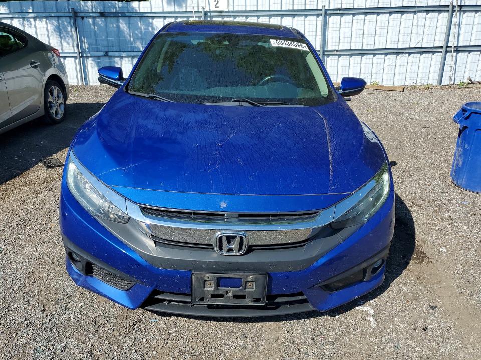 Photo 5 from auction – 2018 HONDA CIVIC with VIN 2HGFC1F92JH103819