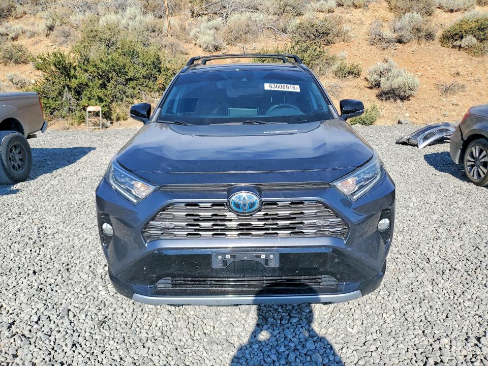Photo 5 from auction – 2021 TOYOTA RAV4 with VIN 4T3E6RFV4MU033256