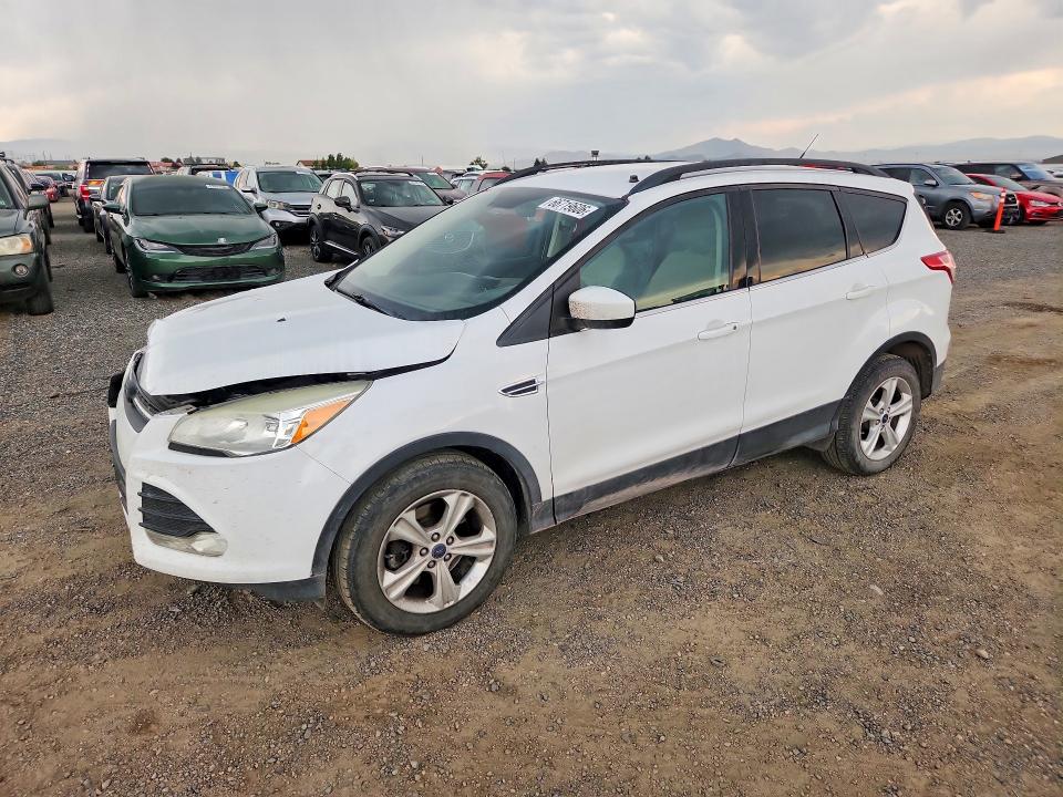 FORD ESCAPE 2014 with VIN 1FMCU9GX4EUC70210 - Photo from auction
