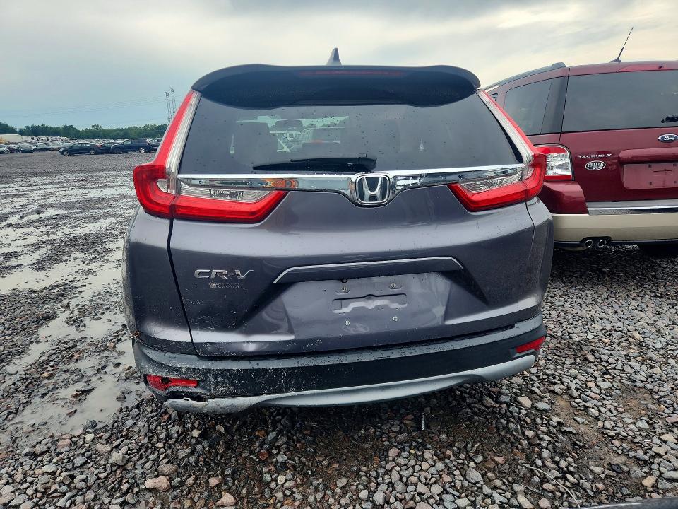 Photo 6 from auction – 2017 HONDA CR-V with VIN 7FARW1H52HE031151
