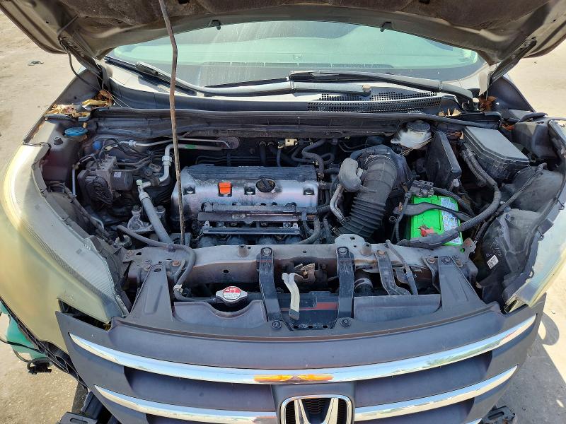 Photo 11 from auction – 2014 HONDA CR-V with VIN 5J6RM3H7XEL015572