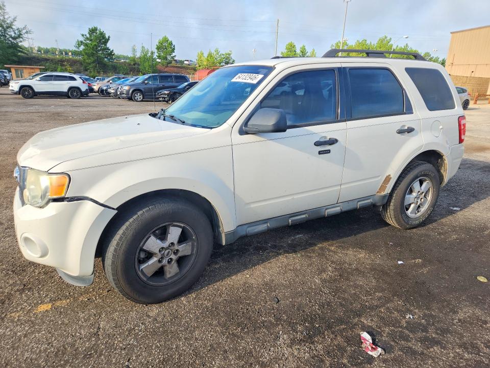 FORD ESCAPE 2011 with VIN 1FMCU0D74BKB54187 - Photo from auction