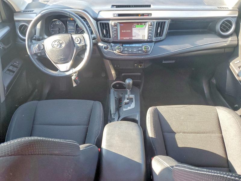 Photo 8 from auction – 2018 TOYOTA RAV4 with VIN 2T3RFREV2JW770230