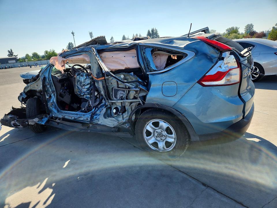 Photo 2 from auction – 2014 HONDA CR-V with VIN 2HKRM3H30EH558677