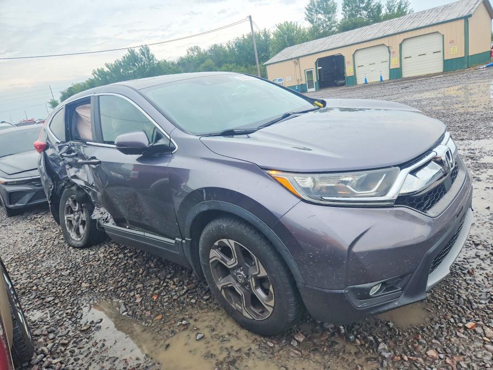 Photo 4 from auction – 2017 HONDA CR-V with VIN 7FARW1H52HE031151