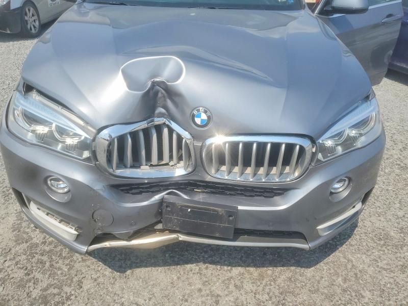 Photo 12 from auction – 2018 BMW X5 with VIN 5UXKR0C57JL074617