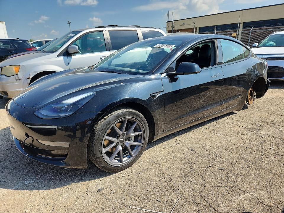 TESLA MODEL 3 2022 with VIN 5YJ3E1EAXNF371665 - Photo from auction