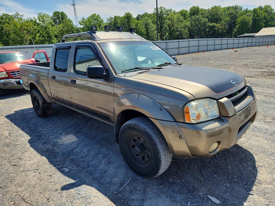 Photo 4 from auction – 2002 NISSAN FRONTIER with VIN 1N6ED29Y02C331531