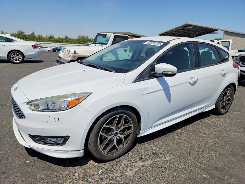 FORD FOCUS 2015 with VIN 1FADP3K2XFL222054 - Photo from auction