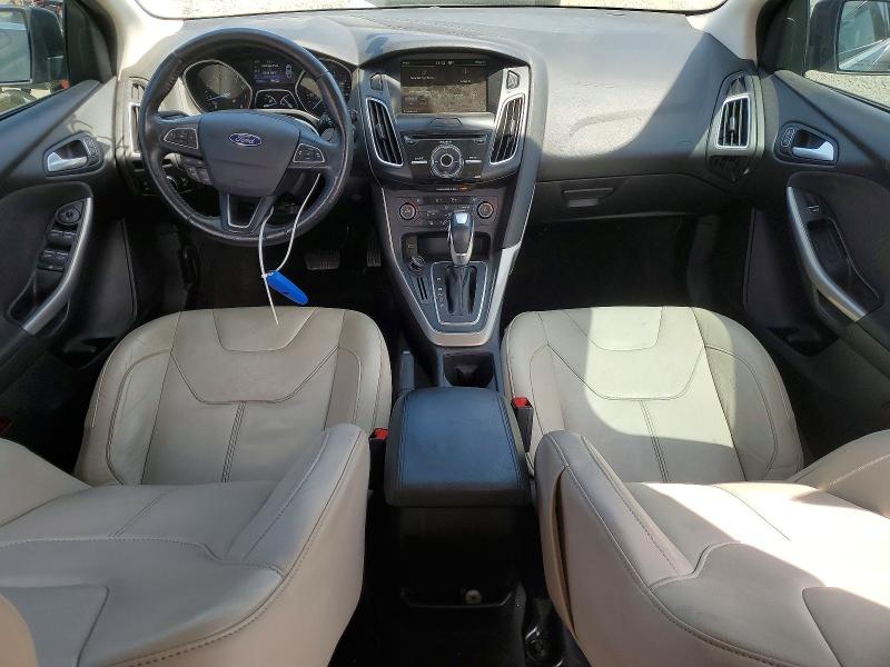 Foto 8 de la subasta – 2015 FORD FOCUS con VIN 1FADP3N23FL293530