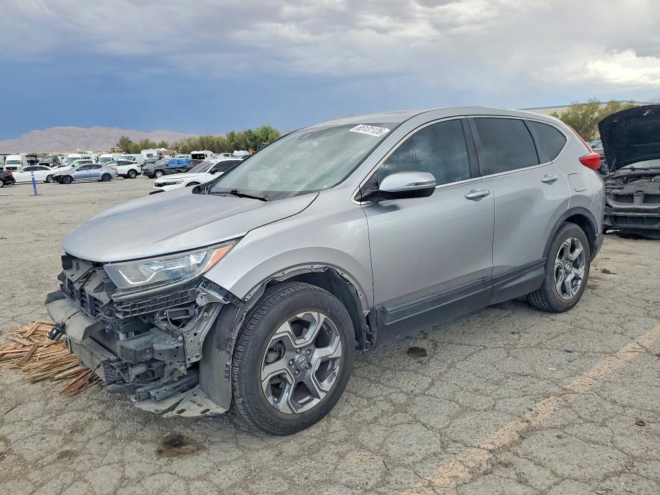 HONDA CR-V 2017 with VIN 7FARW1H88HE011433 - Photo from auction
