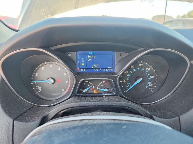 Photo 9 from auction – 2014 FORD FOCUS with VIN 1FADP3K23EL105351