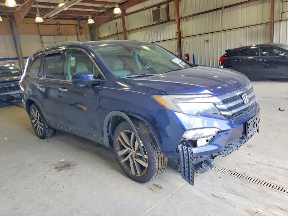 Photo 4 from auction – 2016 HONDA PILOT with VIN 5FNYF6H92GB061529