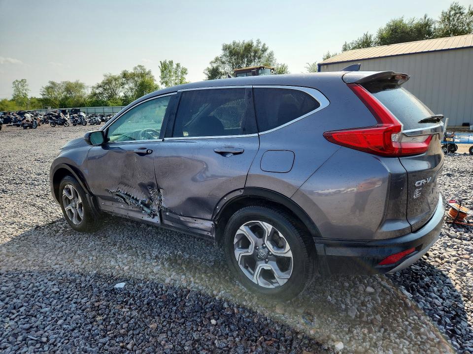 Photo 2 from auction – 2018 HONDA CR-V with VIN 7FARW2H52JE073847