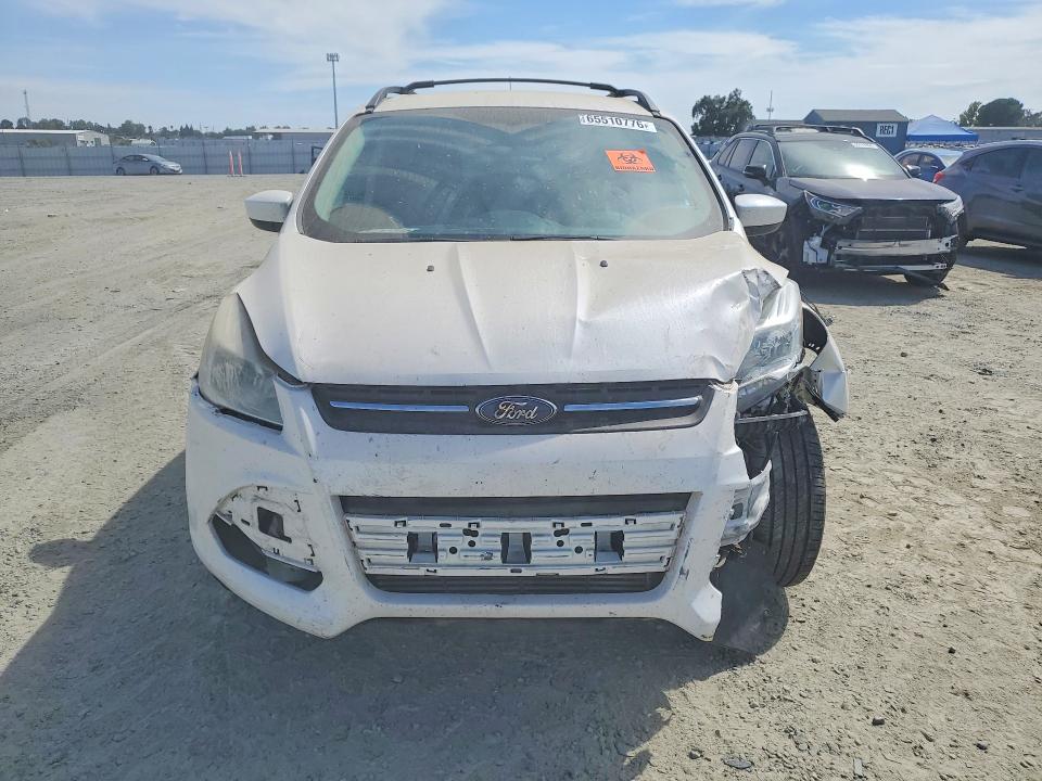 Photo 5 from auction – 2013 FORD ESCAPE with VIN 1FMCU0G97DUD18309