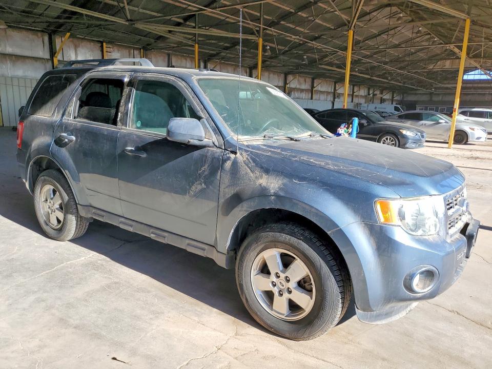 Photo 4 from auction – 2011 FORD ESCAPE with VIN 1FMCU0DG5BKC40950