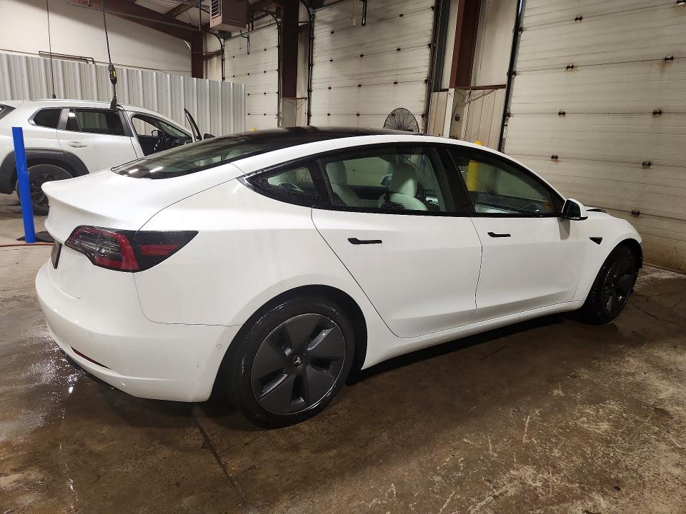 Photo 3 from auction – 2021 TESLA MODEL 3 with VIN 5YJ3E1EA2MF908687