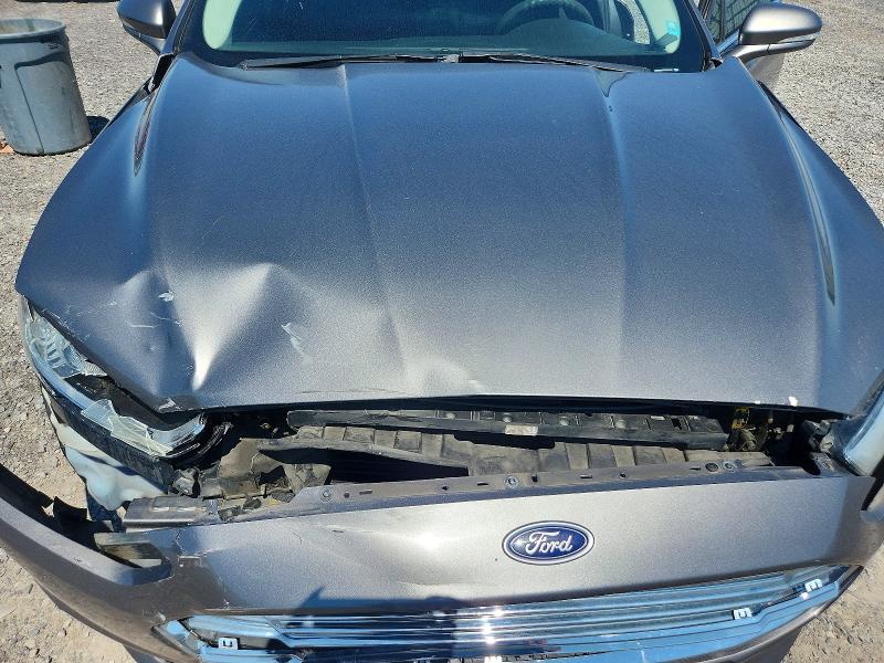 Photo 11 from auction – 2014 FORD FUSION with VIN 3FA6P0H7XER105052