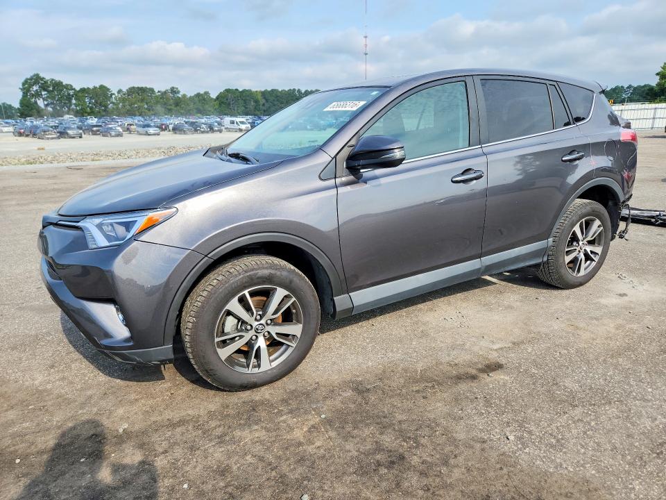 TOYOTA RAV4 2018 with VIN 2T3WFREV1JW477812 - Photo from auction