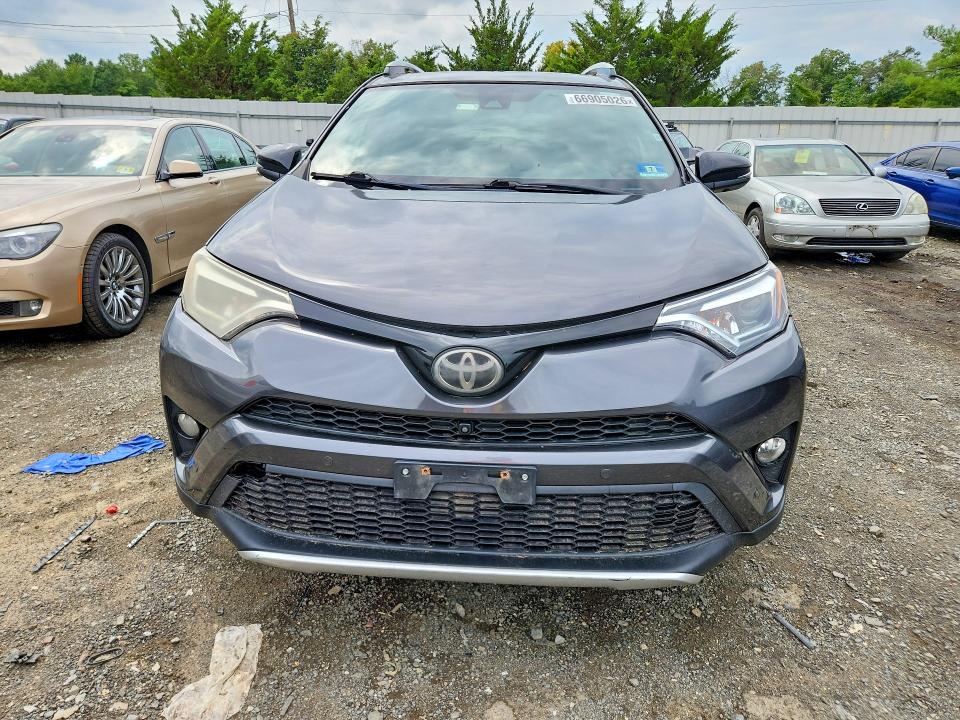 Photo 5 from auction – 2016 TOYOTA RAV4 with VIN JTMJFREV5GJ092271