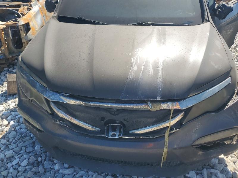 Photo 12 from auction – 2018 HONDA PILOT with VIN 5FNYF6H18JB024924