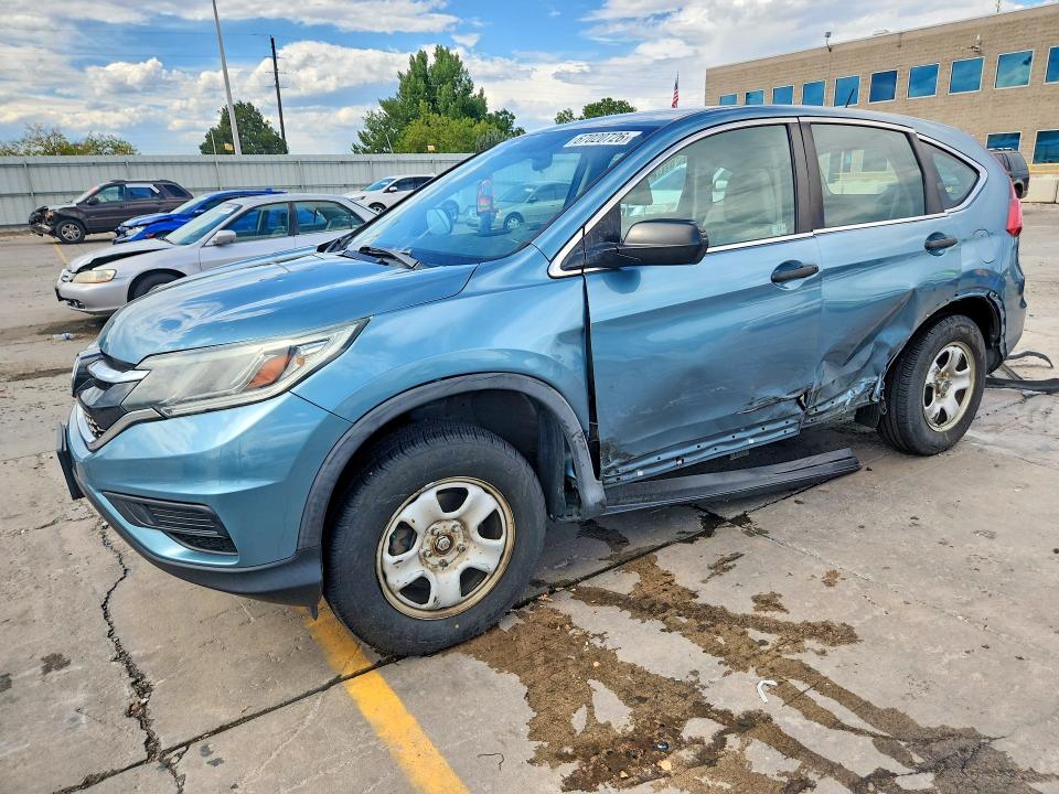HONDA CR-V 2015 with VIN 5J6RM4H32FL083384 - Photo from auction