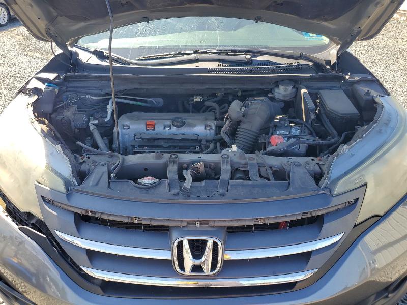 Photo 12 from auction – 2014 HONDA CR-V with VIN 2HKRM4H70EH608115