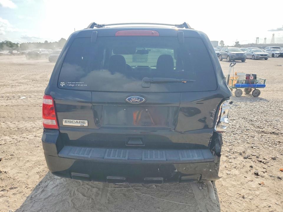 Photo 6 from auction – 2011 FORD ESCAPE with VIN 1FMCU0D75BKA61842