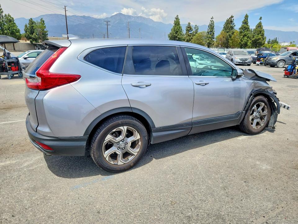 Photo 3 from auction – 2018 HONDA CR-V with VIN 5J6RW1H53JA001807