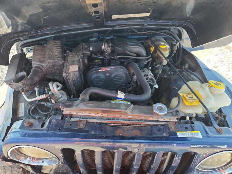 Photo 12 from auction – 2003 JEEP WRANGLER / TJ with VIN 1J4FA29113P334977