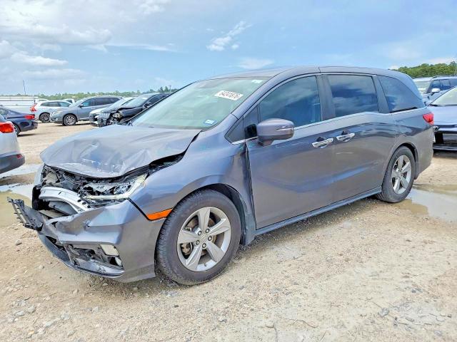 HONDA ODYSSEY 2018 with VIN 5FNRL6H71JB013975 - Photo from auction