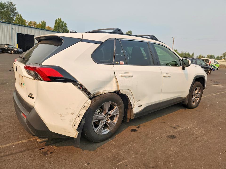 Photo 3 from auction – 2022 TOYOTA RAV4 with VIN JTMMWRFV2ND150022