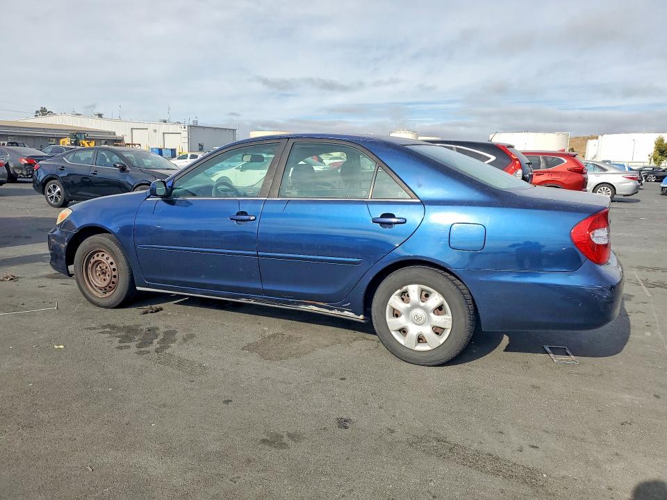 Photo 2 from auction – 2002 TOYOTA CAMRY with VIN JTDBE32K020096063