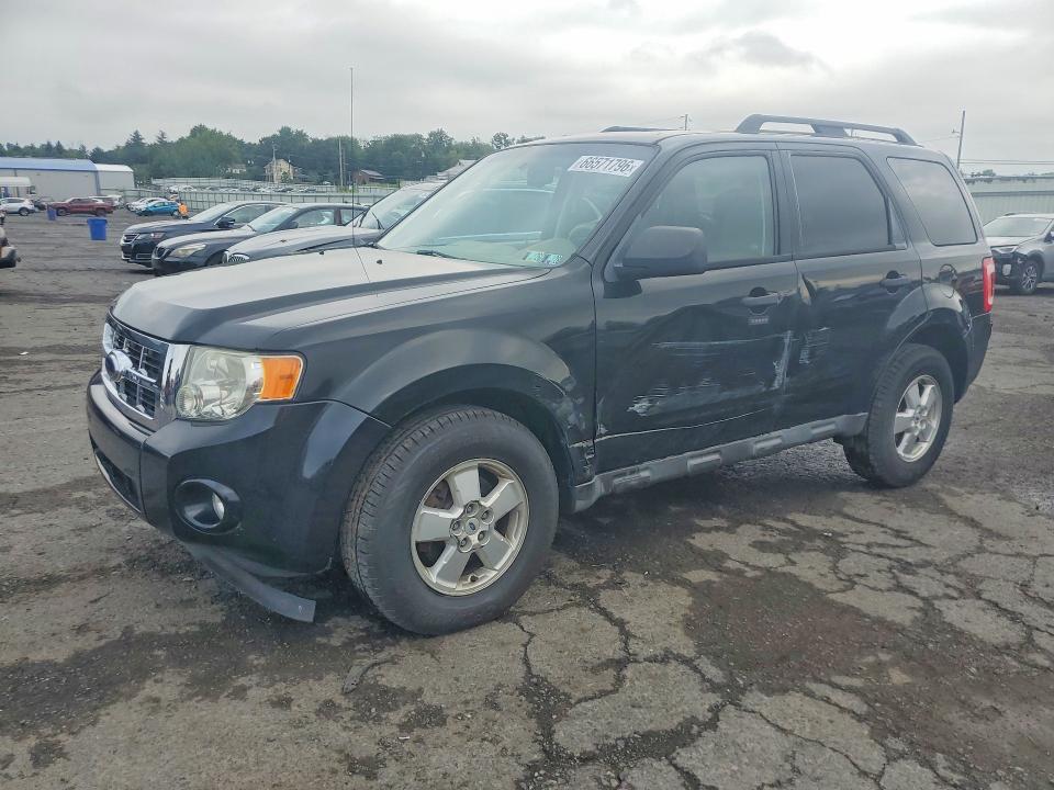 FORD ESCAPE 2010 with VIN 1FMCU9D79AKA33495 - Photo from auction