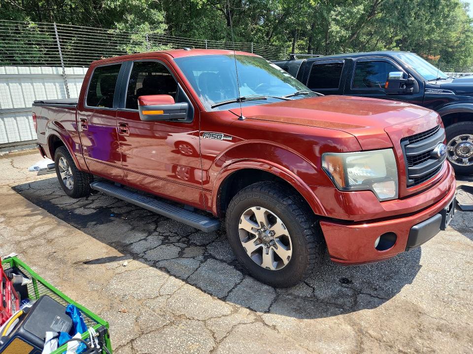 Photo 4 from auction – 2014 FORD F150 with VIN 1FTFW1CF3EKD09052