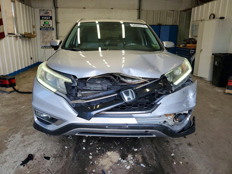 Photo 5 from auction – 2015 HONDA CR-V with VIN 5J6RM4H95FL132811