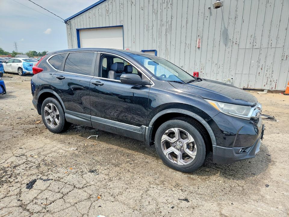 Photo 4 from auction – 2018 HONDA CR-V with VIN 7FARW2H87JE014058