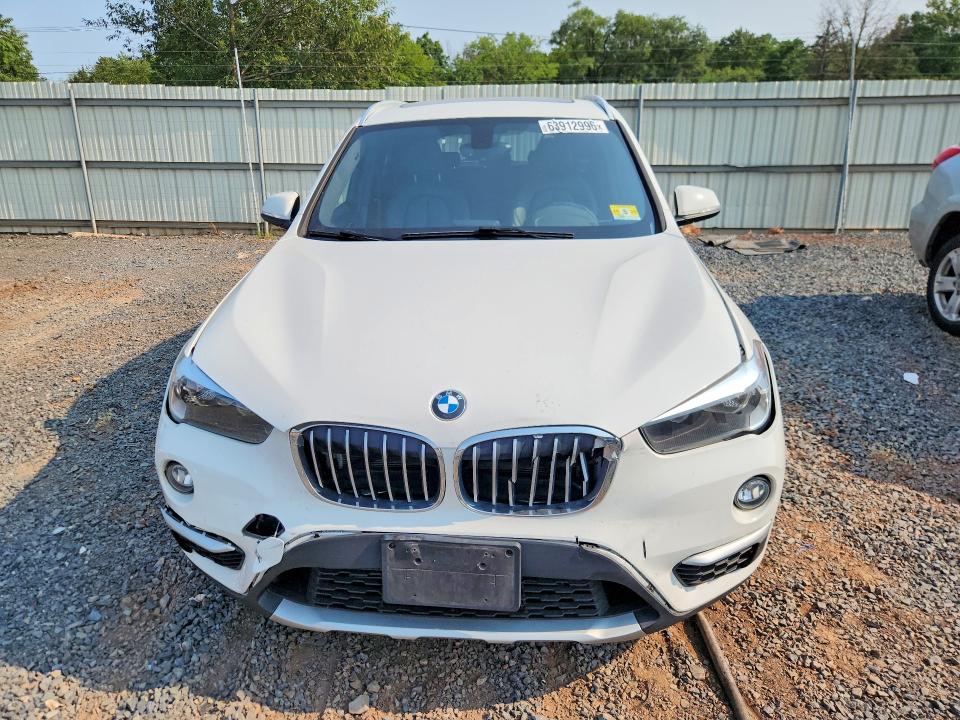 Photo 5 from auction – 2018 BMW X1 with VIN WBXHT3C32J5L33180