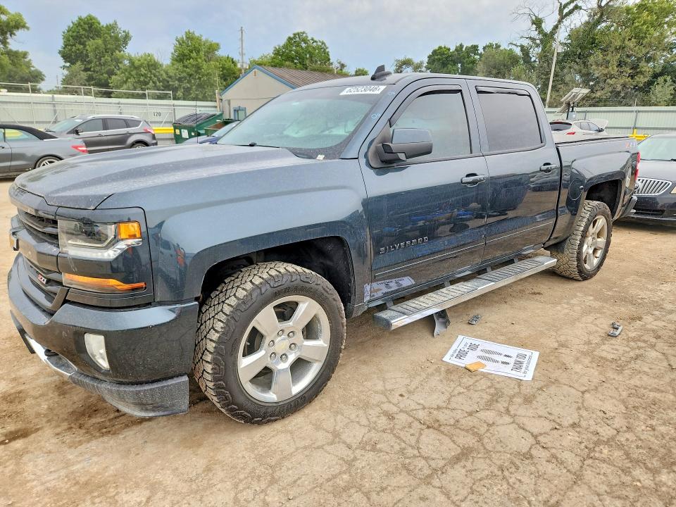 CHEVROLET SILVERADO 2018 with VIN 3GCUKREC0JG143644 - Photo from auction